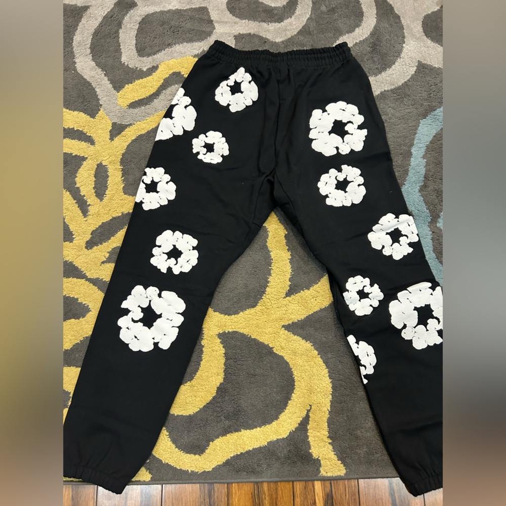 Black denim tear pants